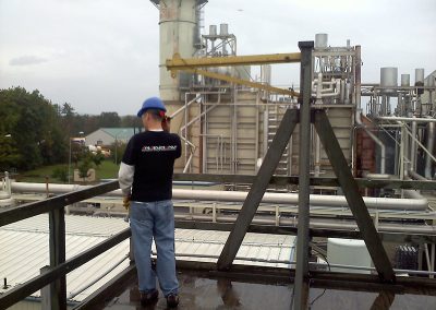 FSG employee Victor working on Cooling tower on roof